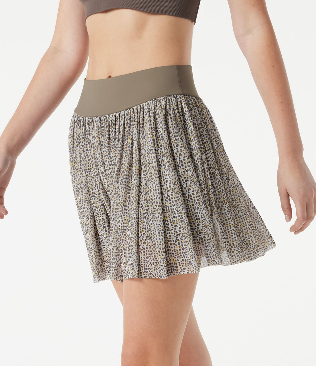 Jupe de sport mini 2-en-1 fluide taille mi-haute en mesh léopard avec poche