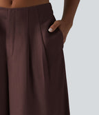 Pantalon large fluide taille haute en lin mélangé avec poches et liens latéraux