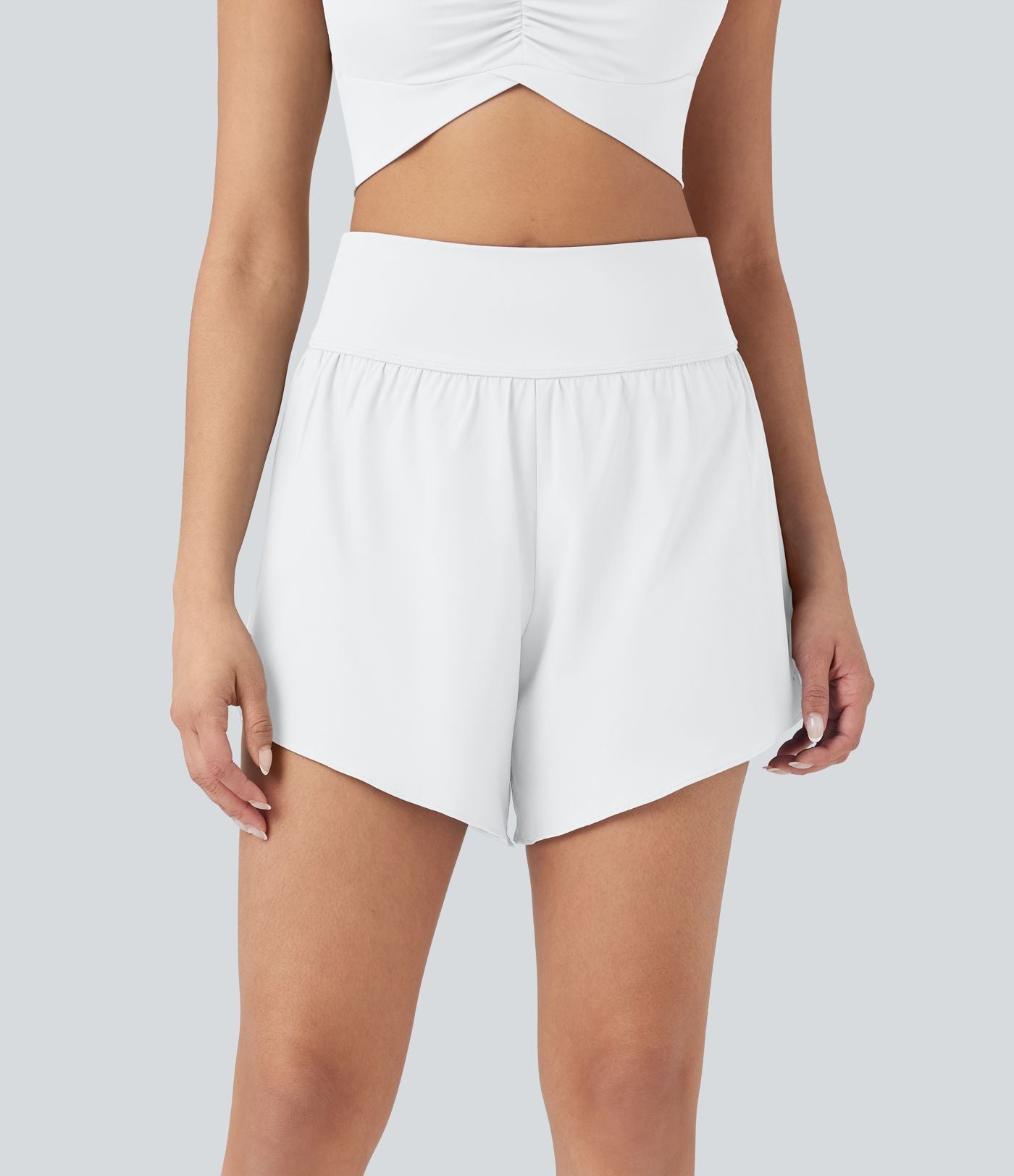 Short 2-en-1 de course gainant taille haute avec points réfléchissants, ourlet croisé et séchage rapide 12,5 cm avec poches SoftlyZero™