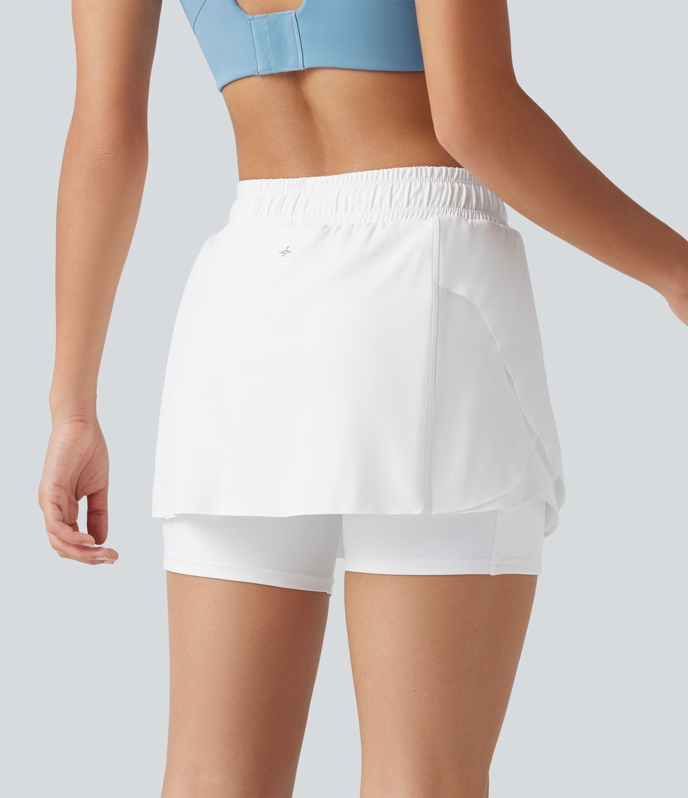 Jupe-short de sport mini SoftlyZero™ Airy taille mi-haute à ourlet croisé, toucher frais, cordon ajustable et poches