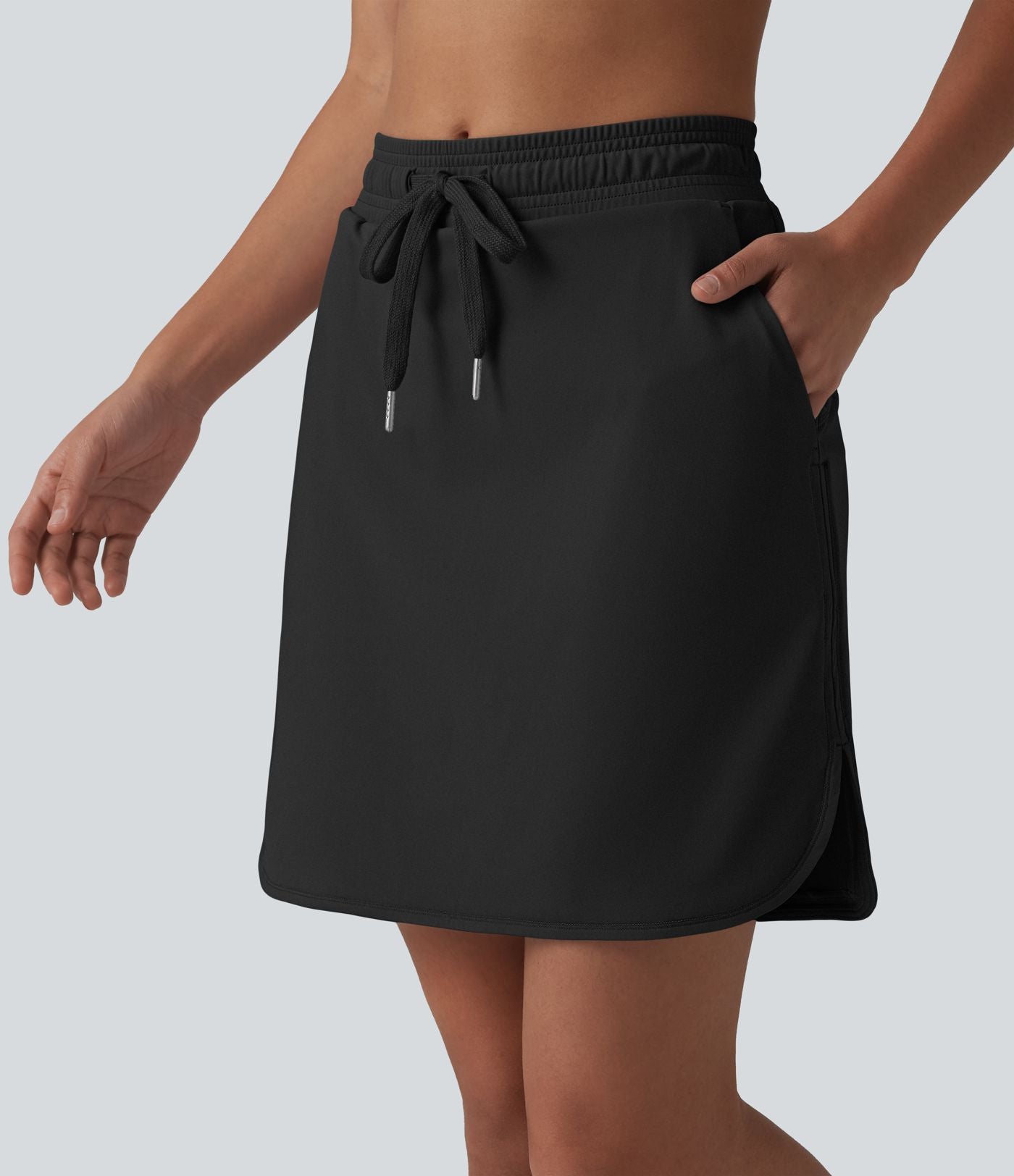 Jupe de sport 2 en 1 SoftlyZero™ Airy, taille mi-haute, ourlet incurvé et cordon de serrage, avec poches