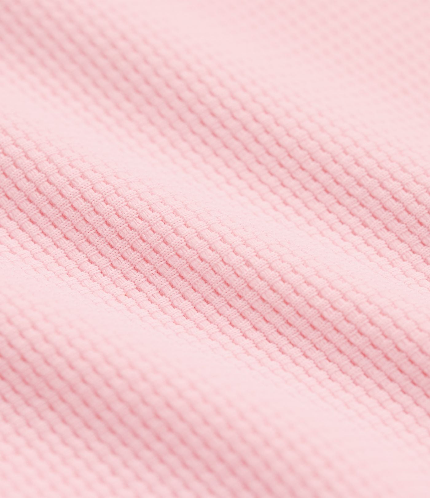 Top gaufré col rond manches longues ourlet arrondi