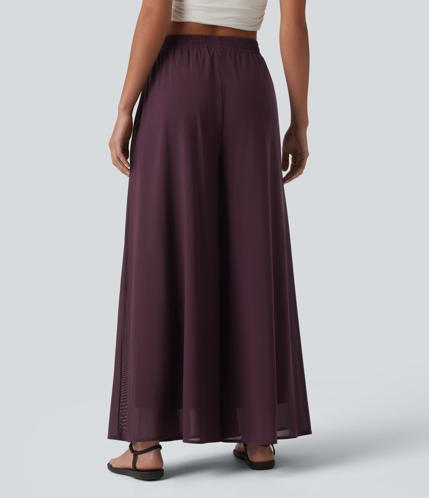 Pantalon fluide et ample avec superposition en mesh, poches latérales et taille haute