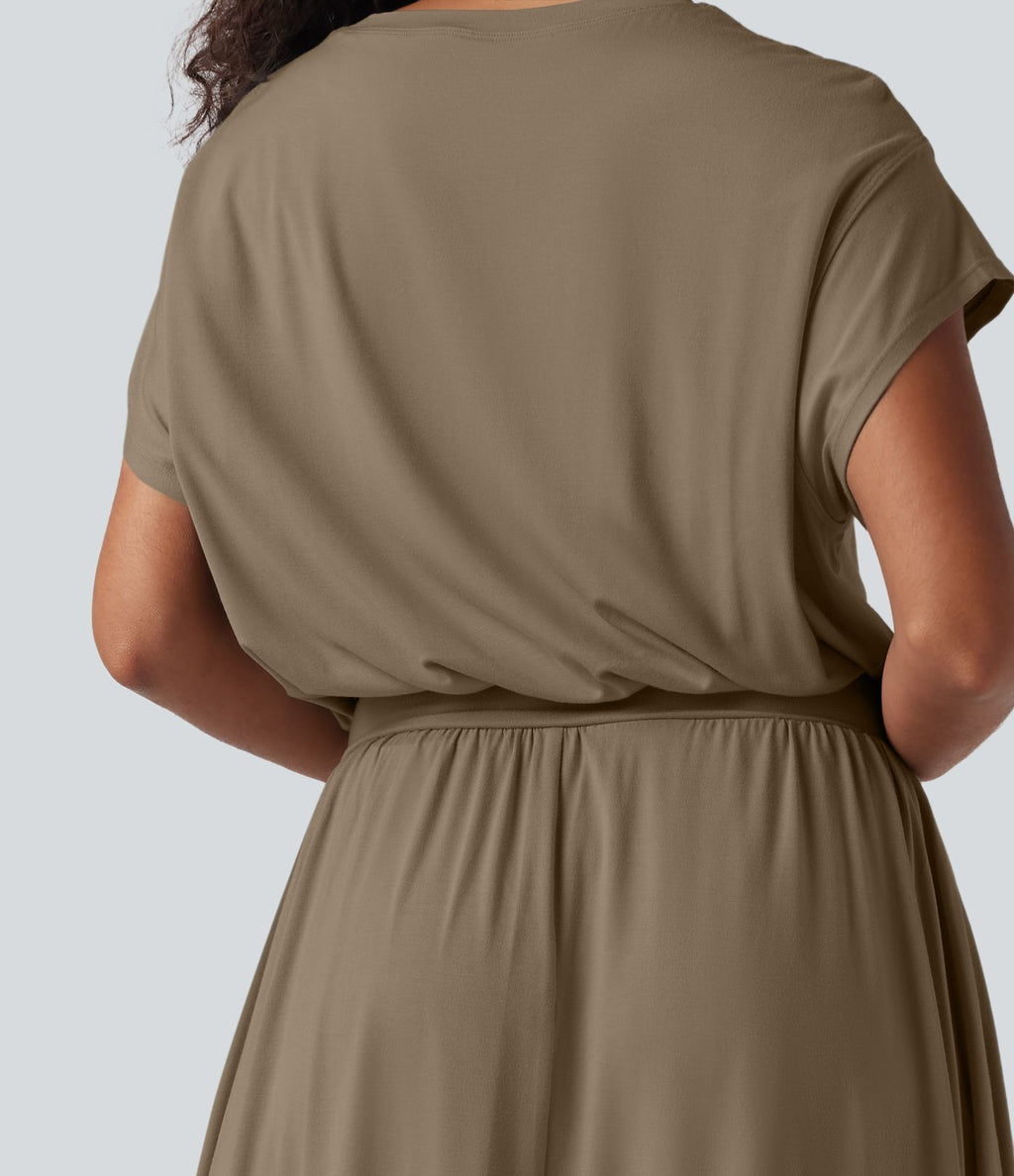 Robe de travail mi-longue fluide gainante à manches chauve-souris avec poches