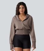 Sweat à capuche zippé avec manches raglan et passe-pouces