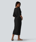 Robe midi col V manches chauve-souris ourlet tulipe torsadé