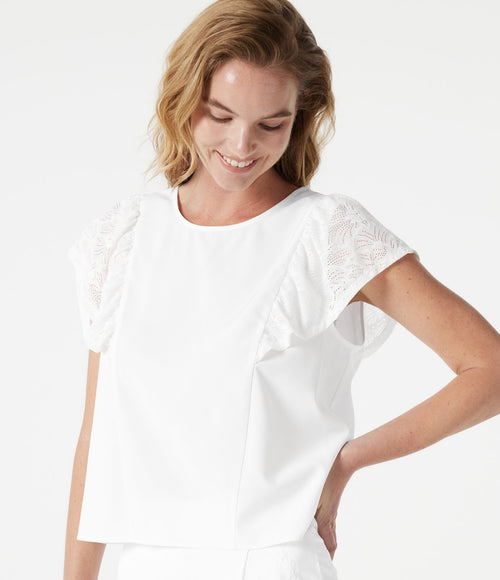 Blouse casual col rond avec découpe goutte d'eau au dos, dentelle contrastée et manches à volants