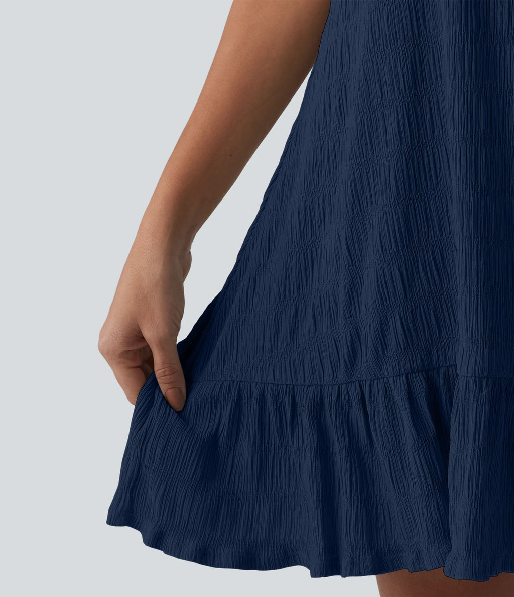 Robe courte décontractée sans manches à col rond, soutien-gorge intégré et ourlet à volants