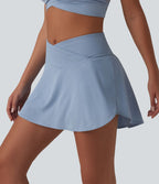Jupe mini de tennis à œillets, taille haute, 2 en 1, coupe trapèze, croisée, avec poches