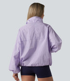 Veste de sport déperlante col montant manches longues zippée avec poches