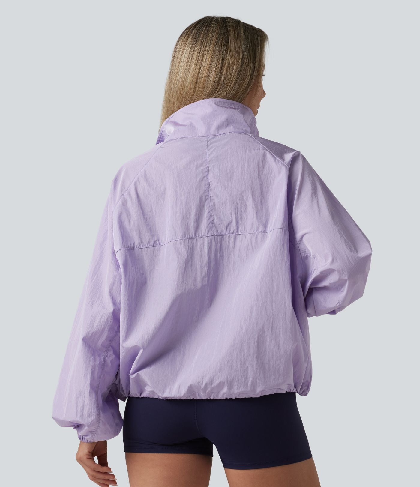 Veste de sport déperlante col montant manches longues zippée avec poches