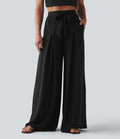 Pantalon large resort taille haute aspect lin avec nœud frontal et poches