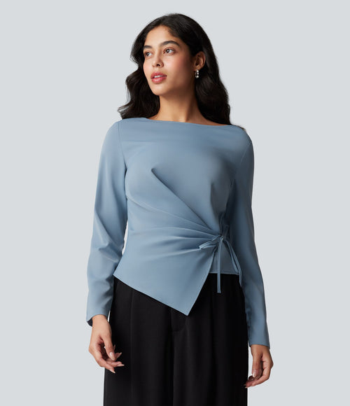 Blouse esprit bureau défroissage facile, encolure bateau, manches longues, fronces et lien côté