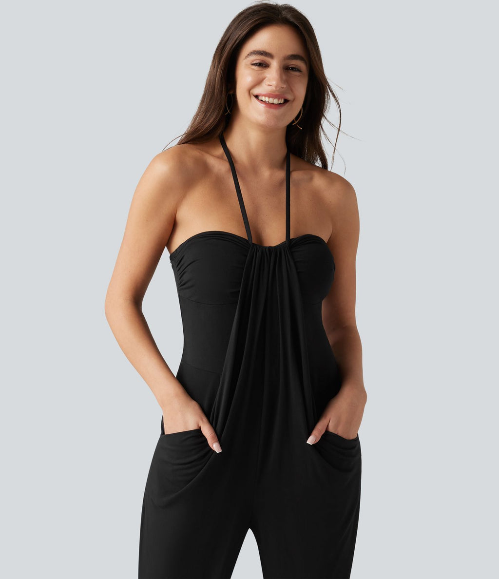 Combinaison-pantalon fuselée de style resort avec soutien-gorge intégré et dos nu à nouer, dotée de poches