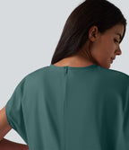 Robe de sport mini de yoga SoftlyZero™ Airy 2-en-1 effet frais InstantCool col rond à manches courtes, demi-zip et poches, accès facile Easy Peasy
