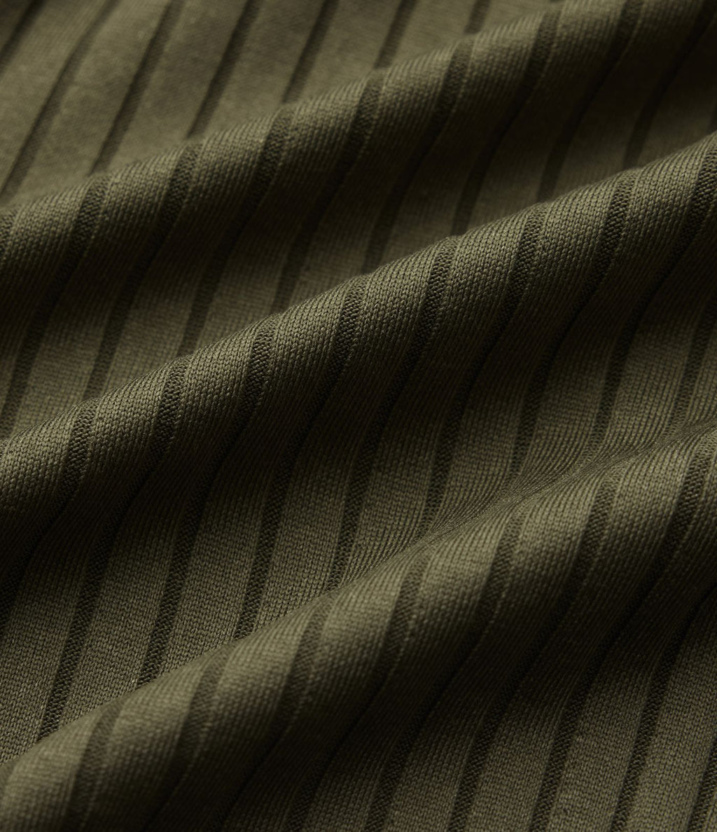 Short en maille côtelée taille mi-haute à cordon de serrage et ourlet ondulé 10 cm avec poches