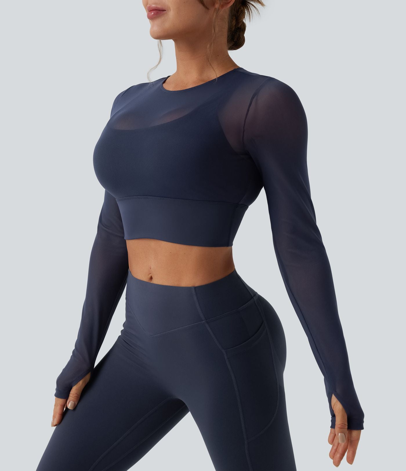 Haut de sport yoga cropped 2-en-1 manches longues mesh contrastant à trous pouces