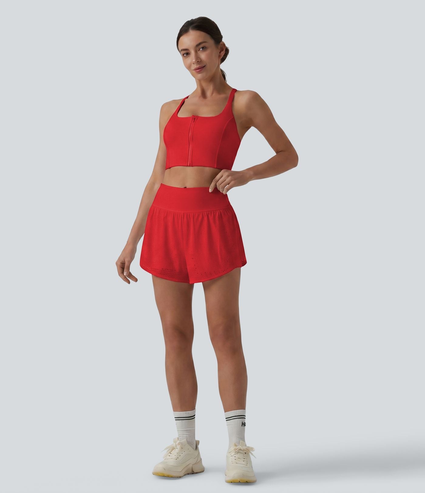 Short yoga 2-en-1 gainant taille haute à pois réfléchissants, ourlet arrondi croisé et œillets avec poches