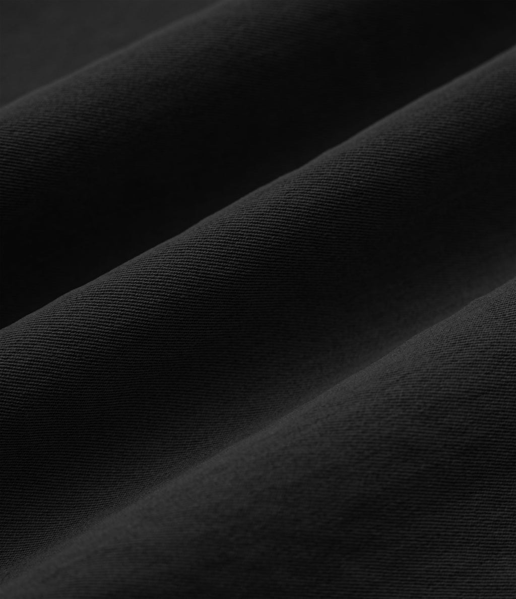 Robe mi-longue plissée col V sans manches avec fermeture éclair invisible et poches pour le travail