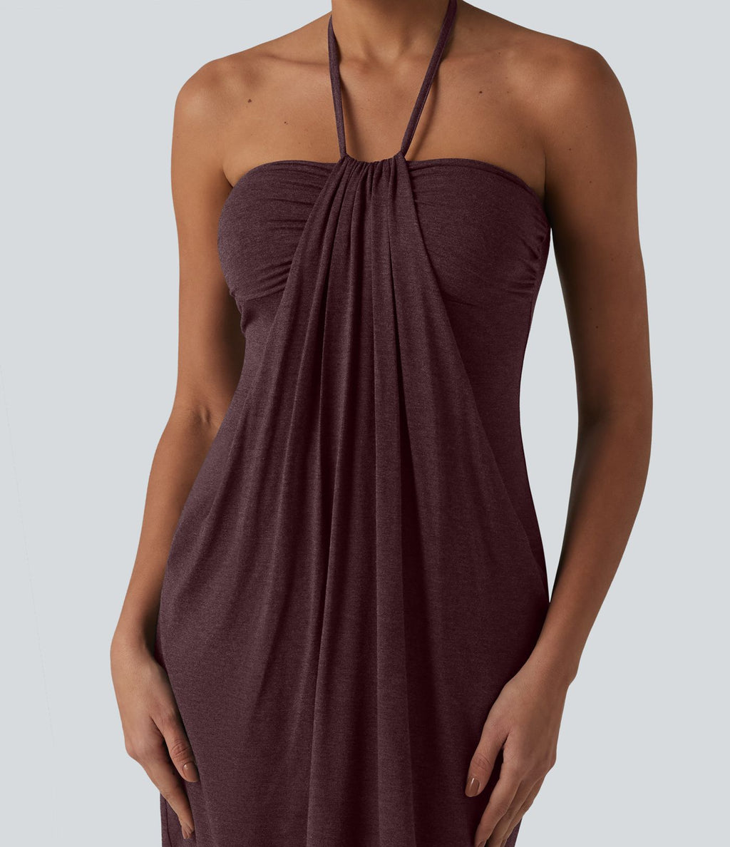 Robe resort mini dos nu à col licou avec lien noué dans le dos et poches