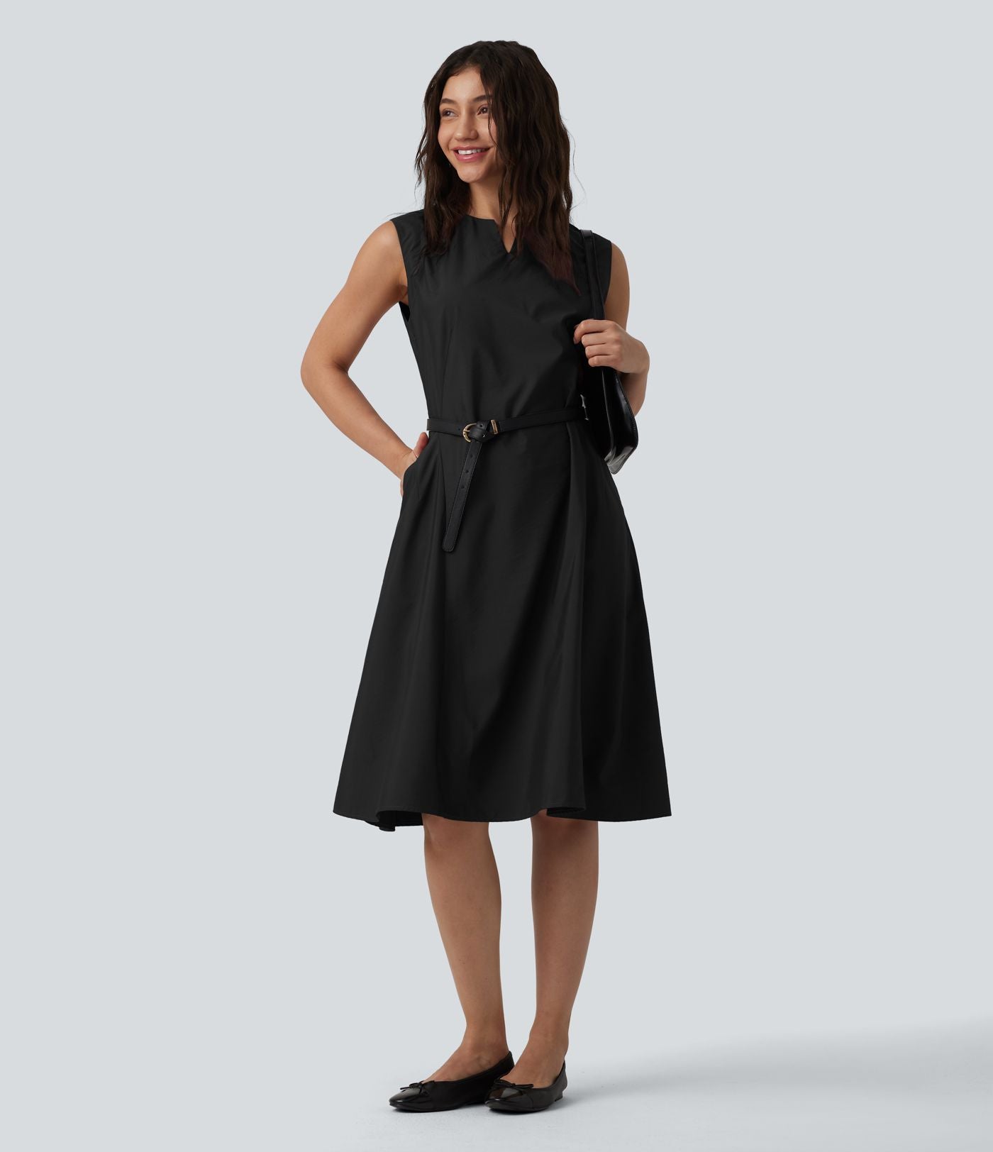 Robe mi-longue évasée de travail col cranté sans manches avec poches