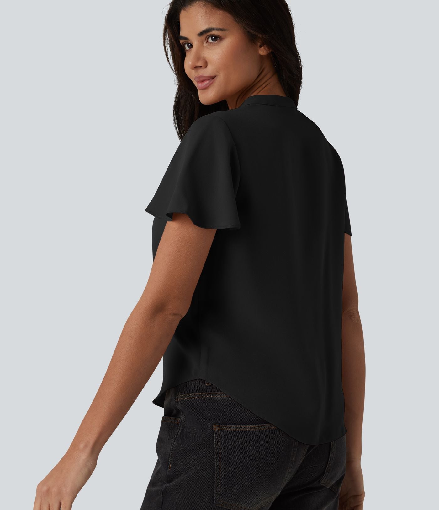 Blouse casual col V à manches volantées et ourlet arrondi