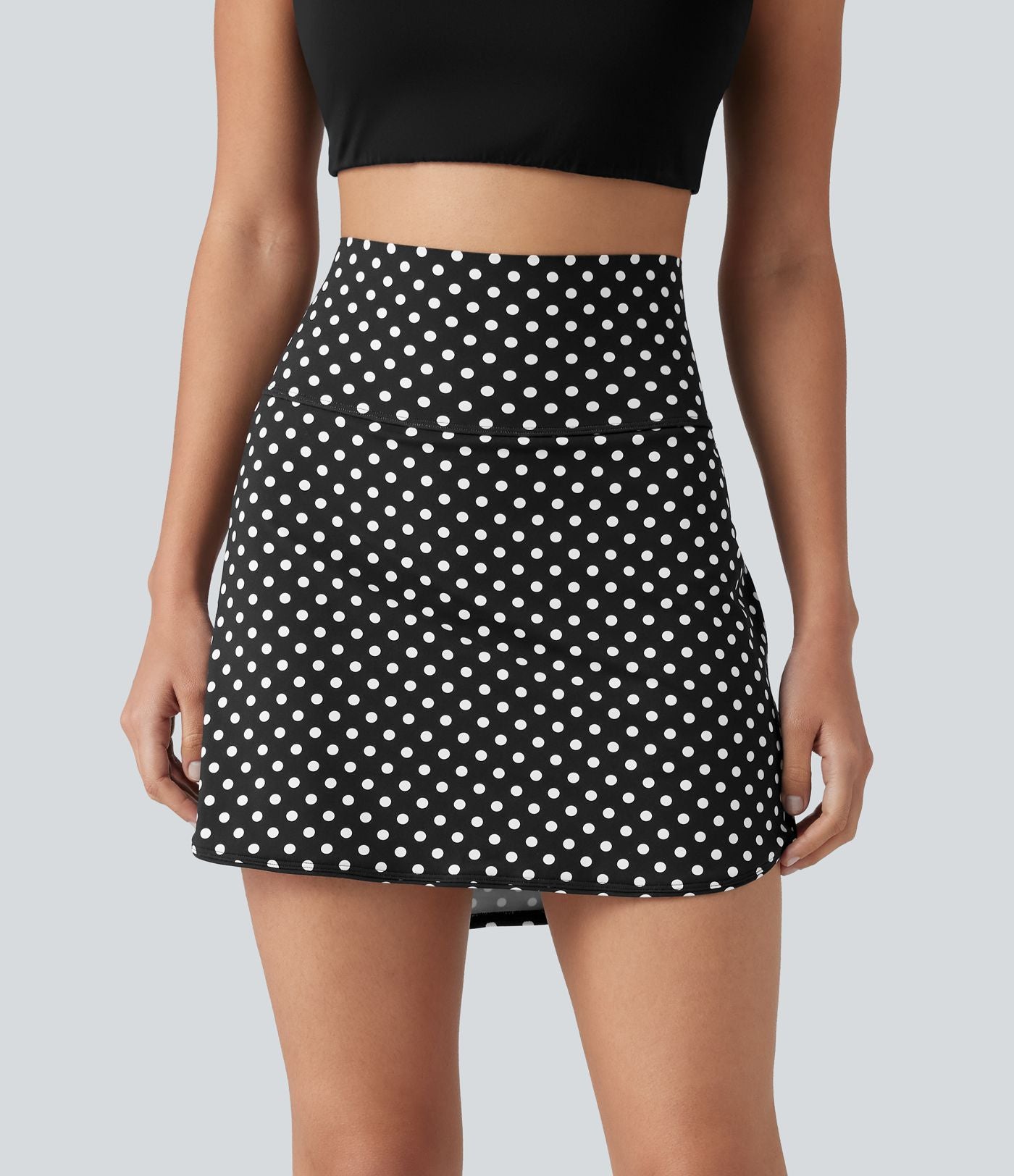 Mini-jupe de golf 2 en 1 à pois, taille ultra haute, effet ventre plat, ourlet arrondi et poches