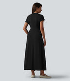 Robe midi à manches courtes chauve-souris et col en V avec poches