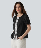 Blouse décontractée col rond manches bouffantes courtes avec dentelle contrastée