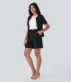 Short tailleur taille haute avec bouton, fermeture éclair et poches latérales