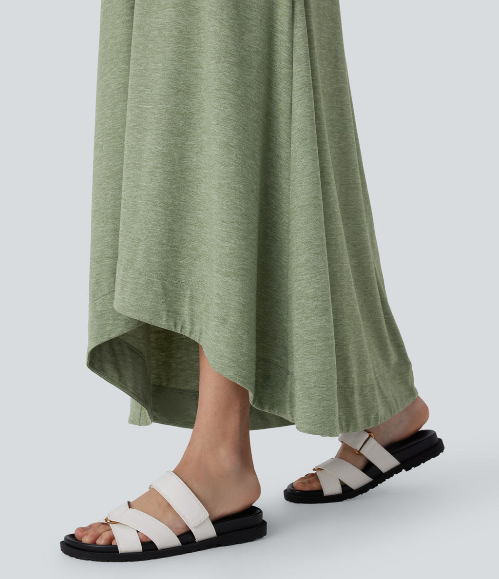 Robe longue décontractée fluide à col rond, sans manches, poches latérales et ourlet asymétrique