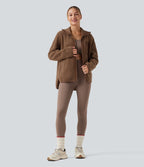 Veste de sport sherpa à manches longues avec ourlet asymétrique arrondi et poches