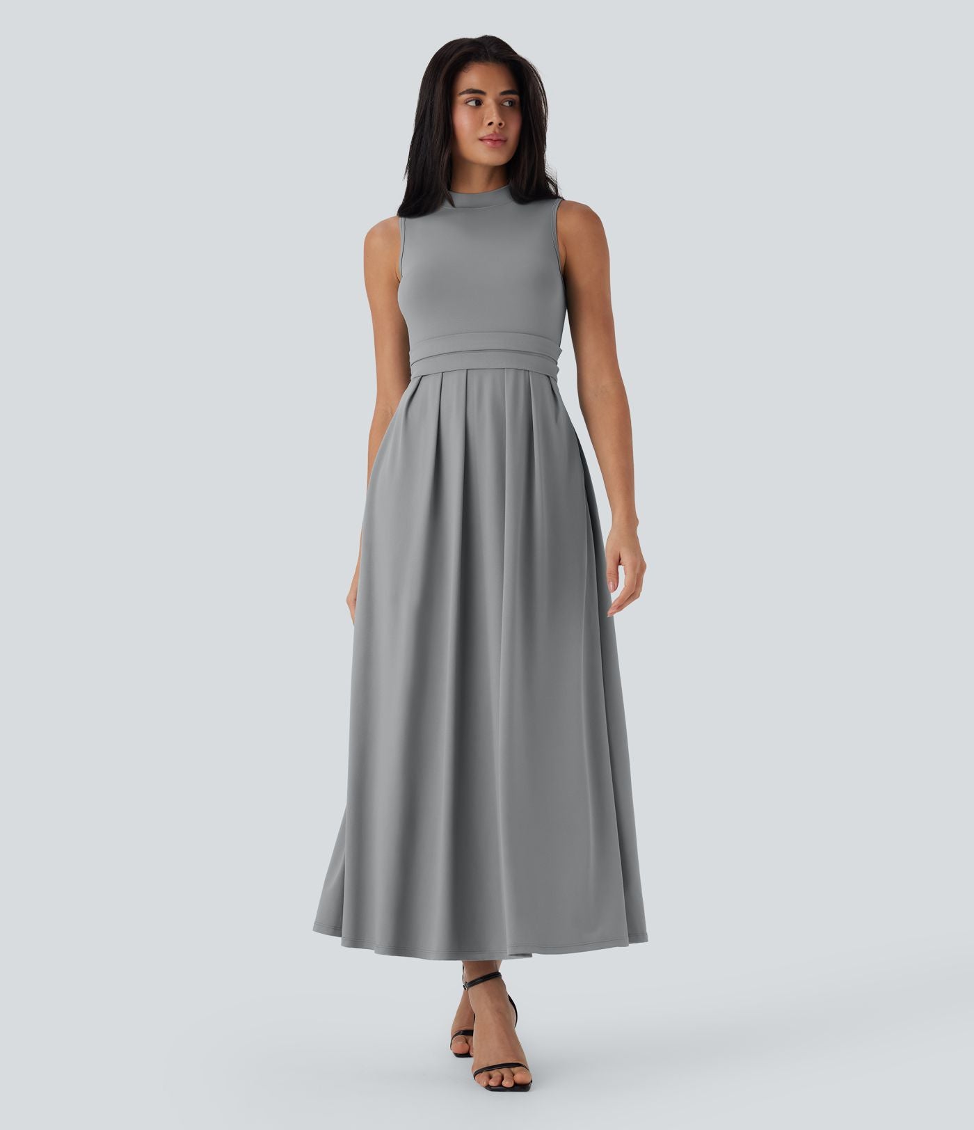 Robe longue décontractée sans manches à col montant, coupe évasée et poches latérales