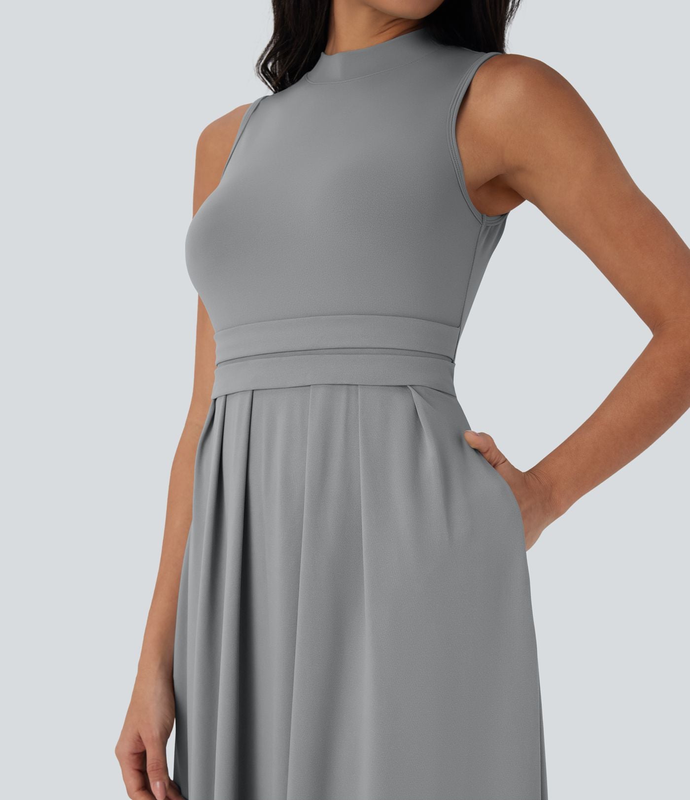 Robe longue décontractée sans manches à col montant, coupe évasée et poches latérales