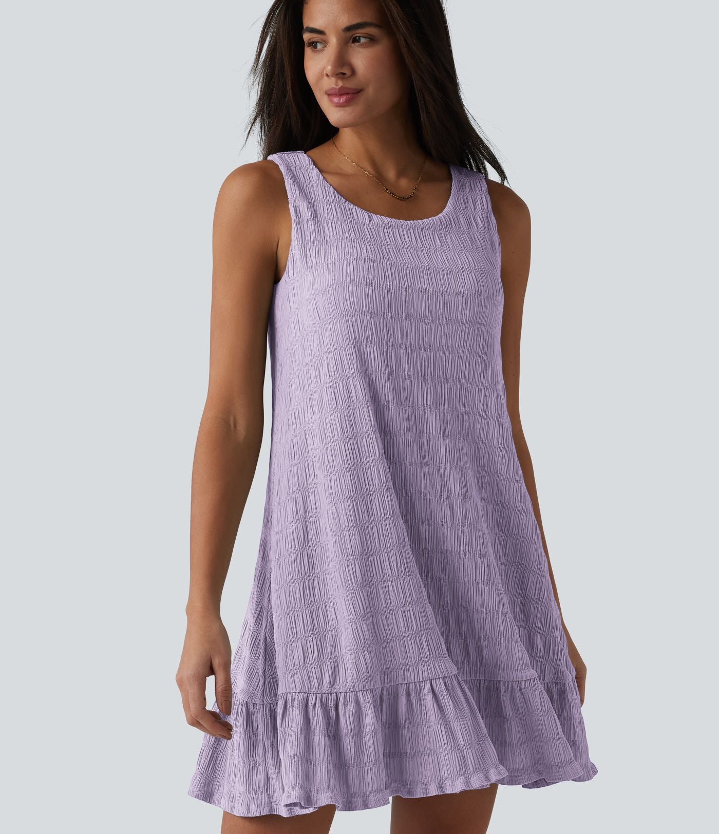 Robe courte décontractée sans manches à col rond, soutien-gorge intégré et ourlet à volants