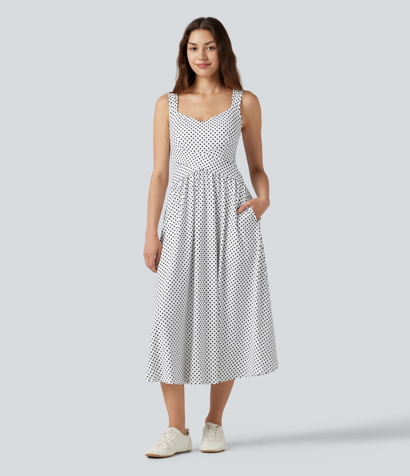 Robe fluide décontractée midi sans manches dos nu croisée à pois avec poches