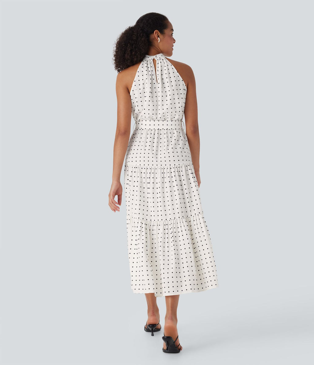 Robe mi-longue fluide de vacances à pois avec col licou, découpe dos, ceinture et poches latérales