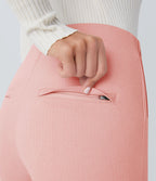 Pantalon tailleur skinny gainant taille haute à chevrons avec poches arrière zippées décoratives
