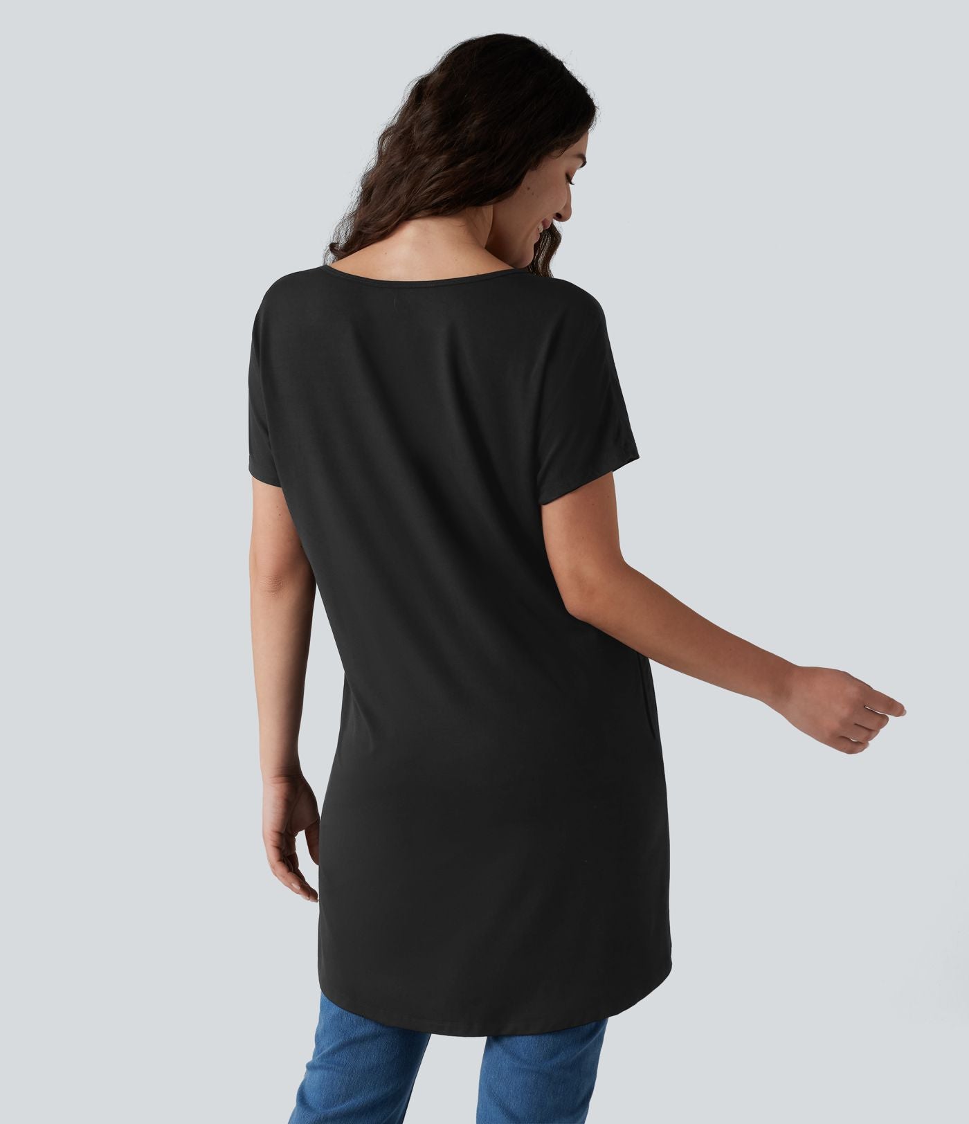T-shirt décontracté à manches courtes et col bateau, coupe asymétrique, avec poches