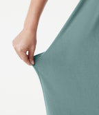 Robe midi dos nu à col halter avec lien noué au dos et poches