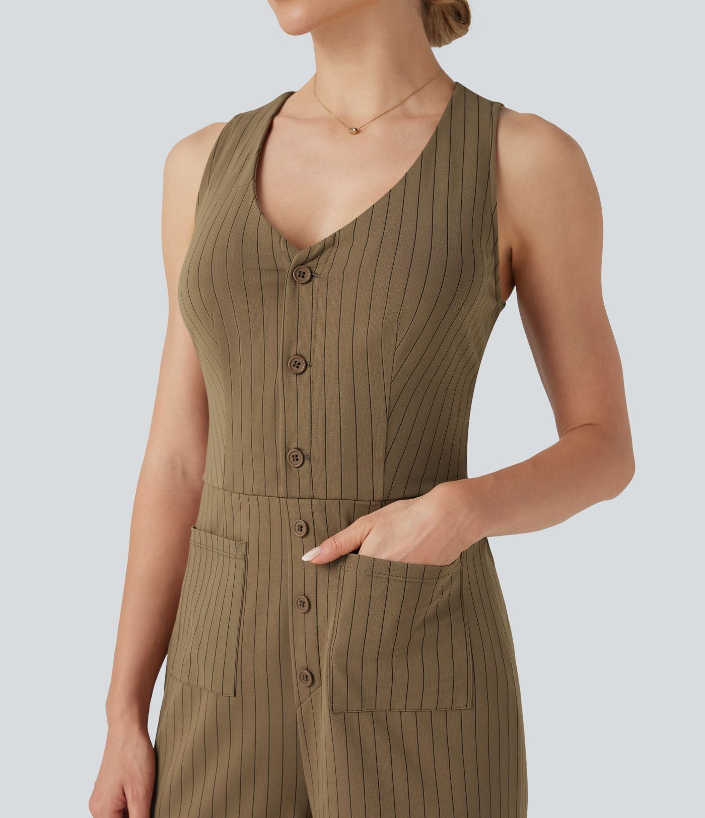 Combinaison tailleur rayée à jambes larges, décolleté en V, découpe et poches