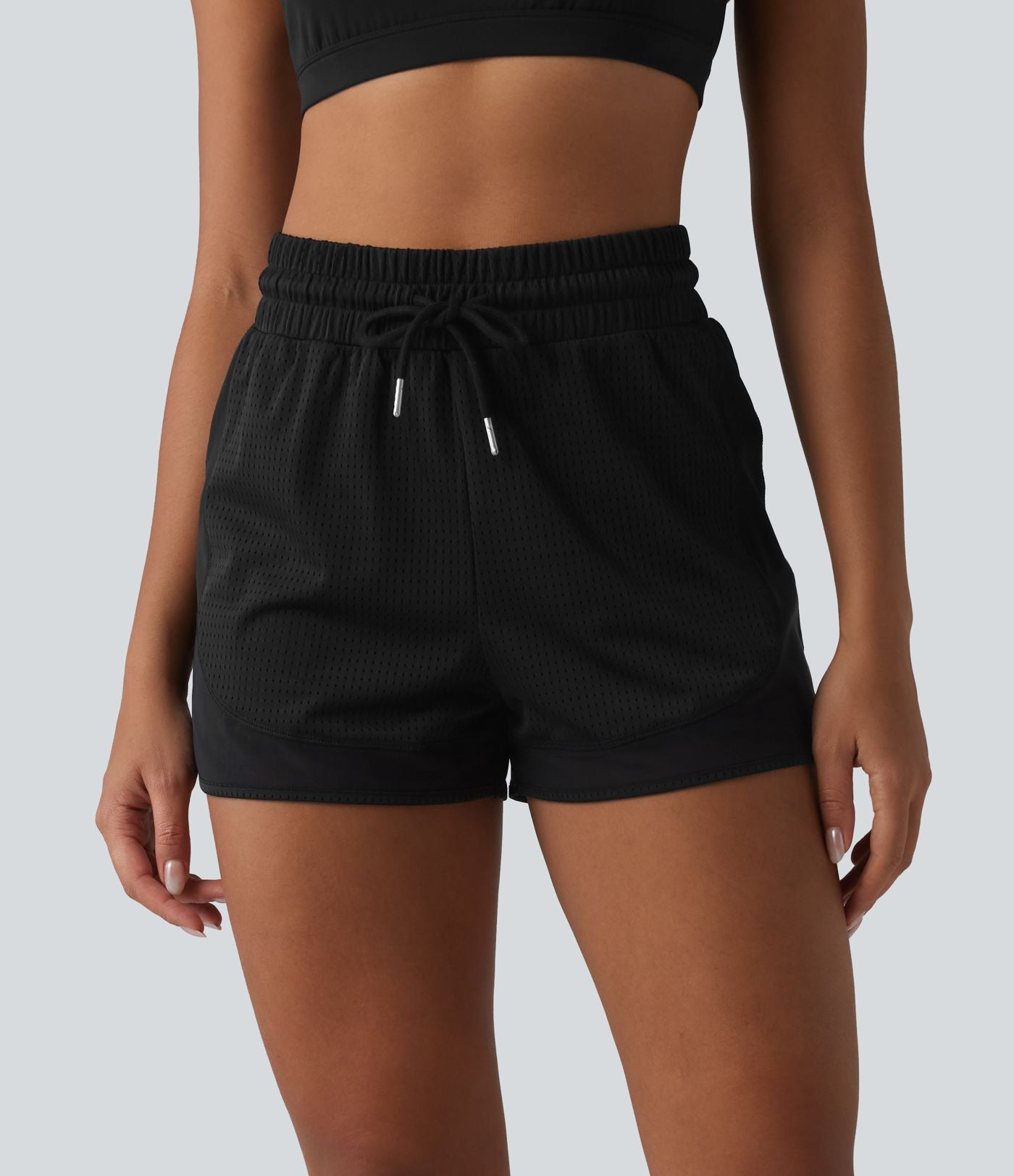 Short de sport 2 en 1 taille haute, cordon de serrage et œillets, en maille respirante