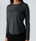 Top de sport yoga rayé ourlet arrondi col rond manches longues