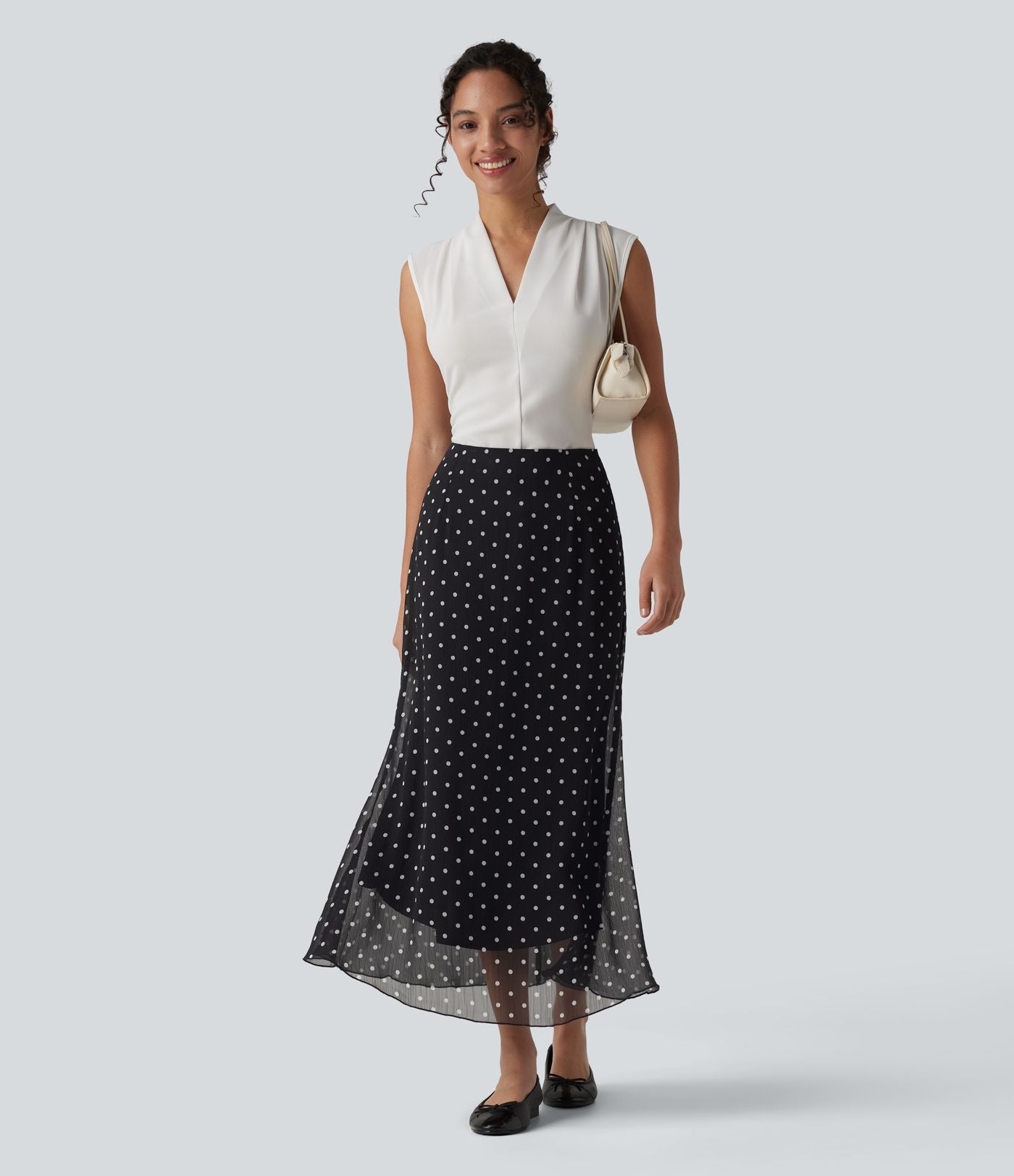 Jupe midi fluide sirène taille haute à pois