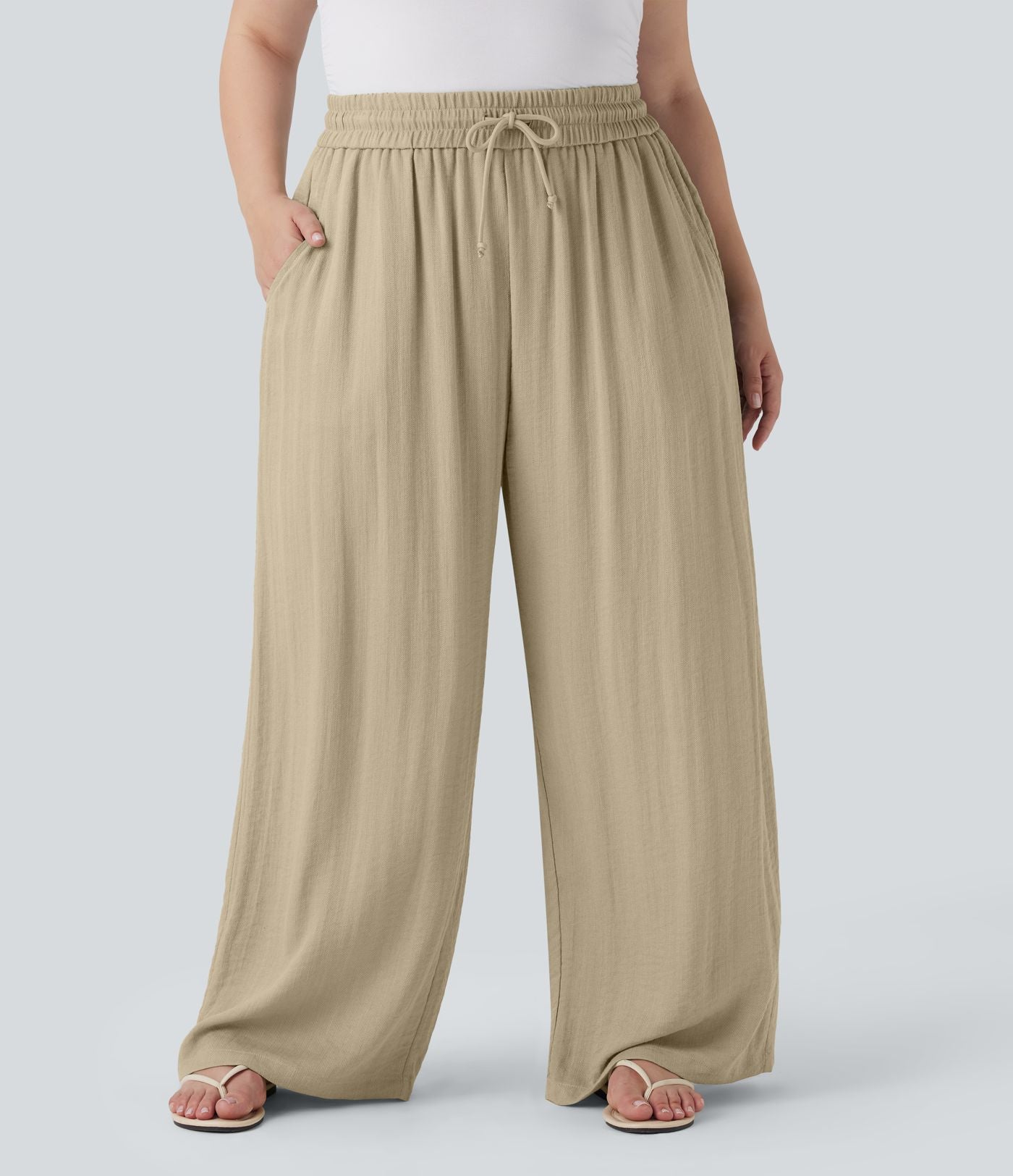 Pantalon décontracté grande taille large fluide taille haute effet lin avec cordon de serrage et poches