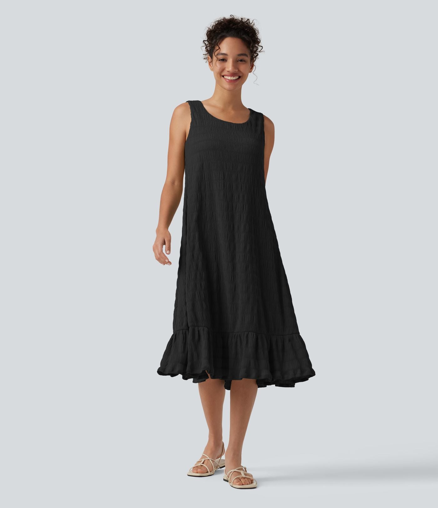 Robe midi sans manches à encolure arrondie avec coussinets amovibles et ourlet à volants