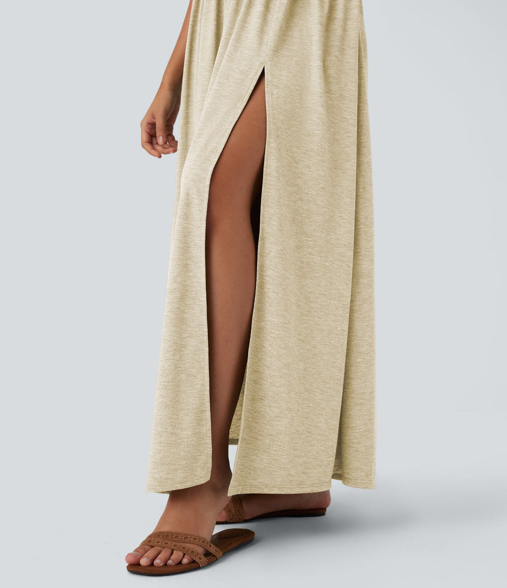 Robe longue fluide fendue avec poches latérales, dos nu et effet torsadé