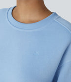 Sweat-shirt décontracté oversize en polaire, col rond, épaules tombantes, manches longues, ourlet fendu, empiècements côtelés contrastés et broderies