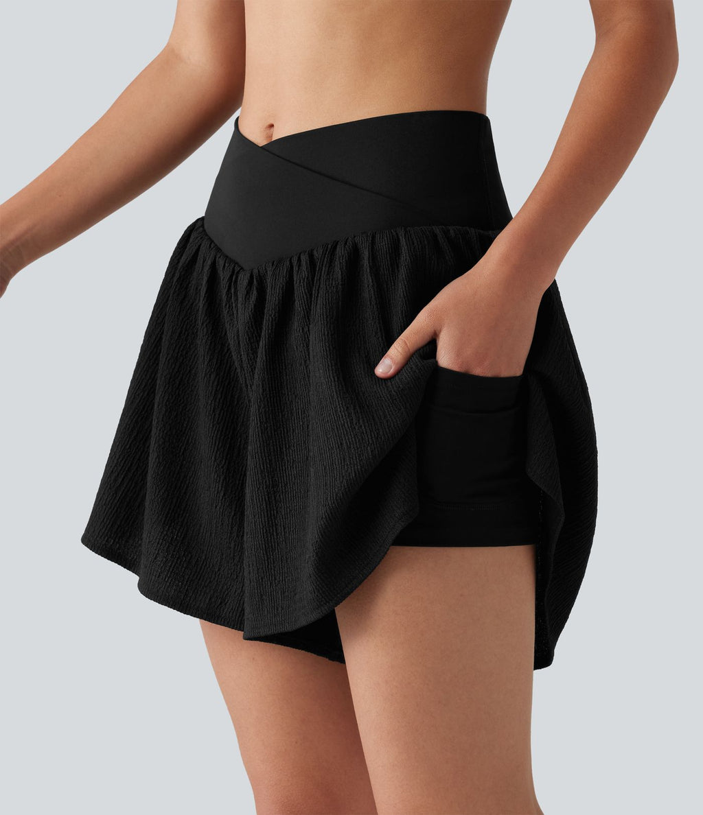 Short de running 2-en-1 taille haute croisée en tissu froissé avec ourlet fendu et poches