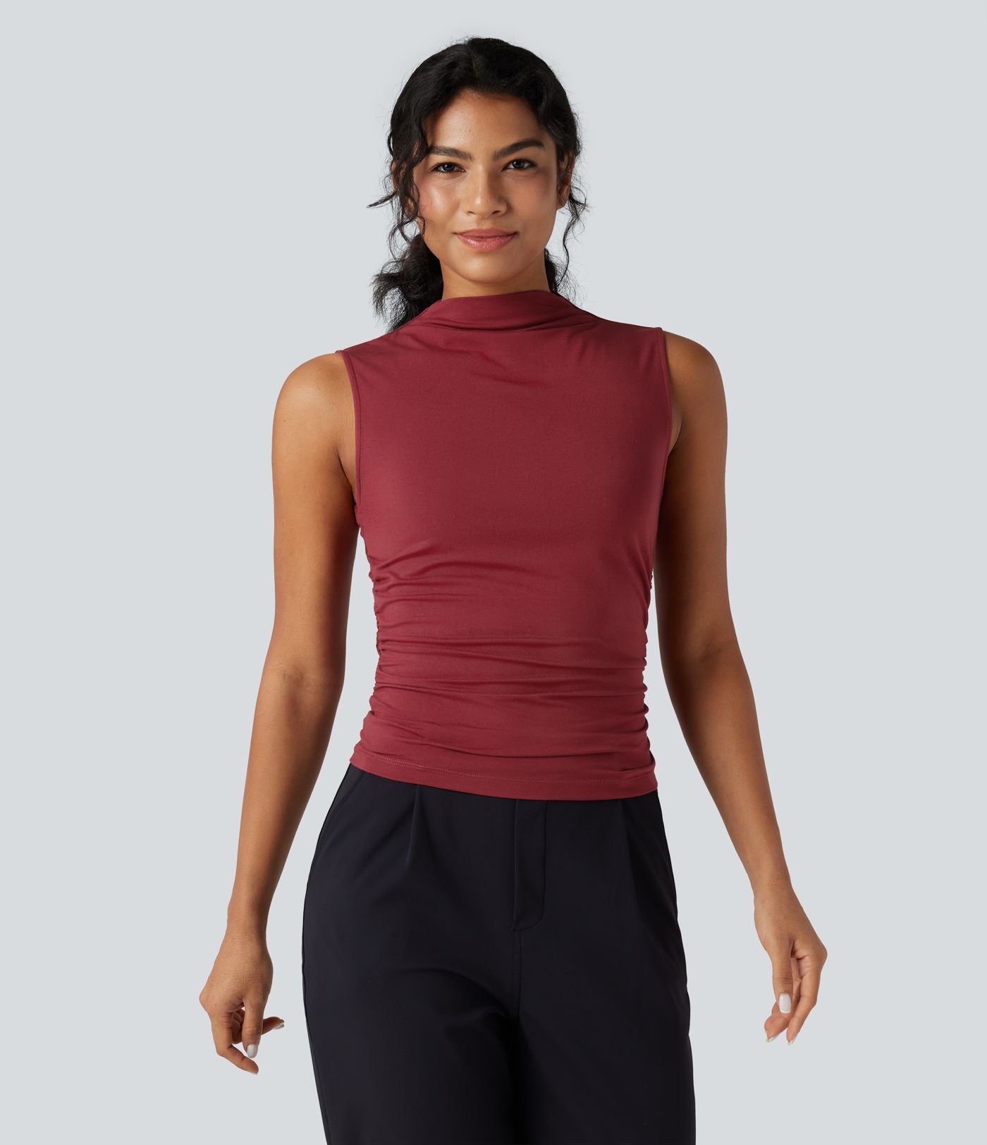 Top tailleur froncé col montant sans manches